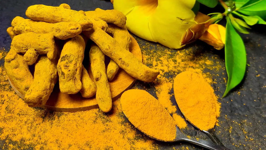 turmeric powder and spoon